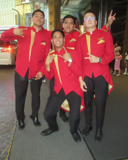 Resort staff in red uniforms at a Manila integrated resort